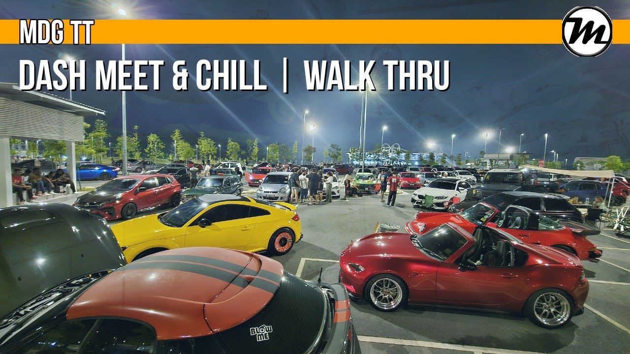 Parked modified cars and enthusiasts at MDG’s nighttime DASH Meet & Chill gathering in Denai Alam.