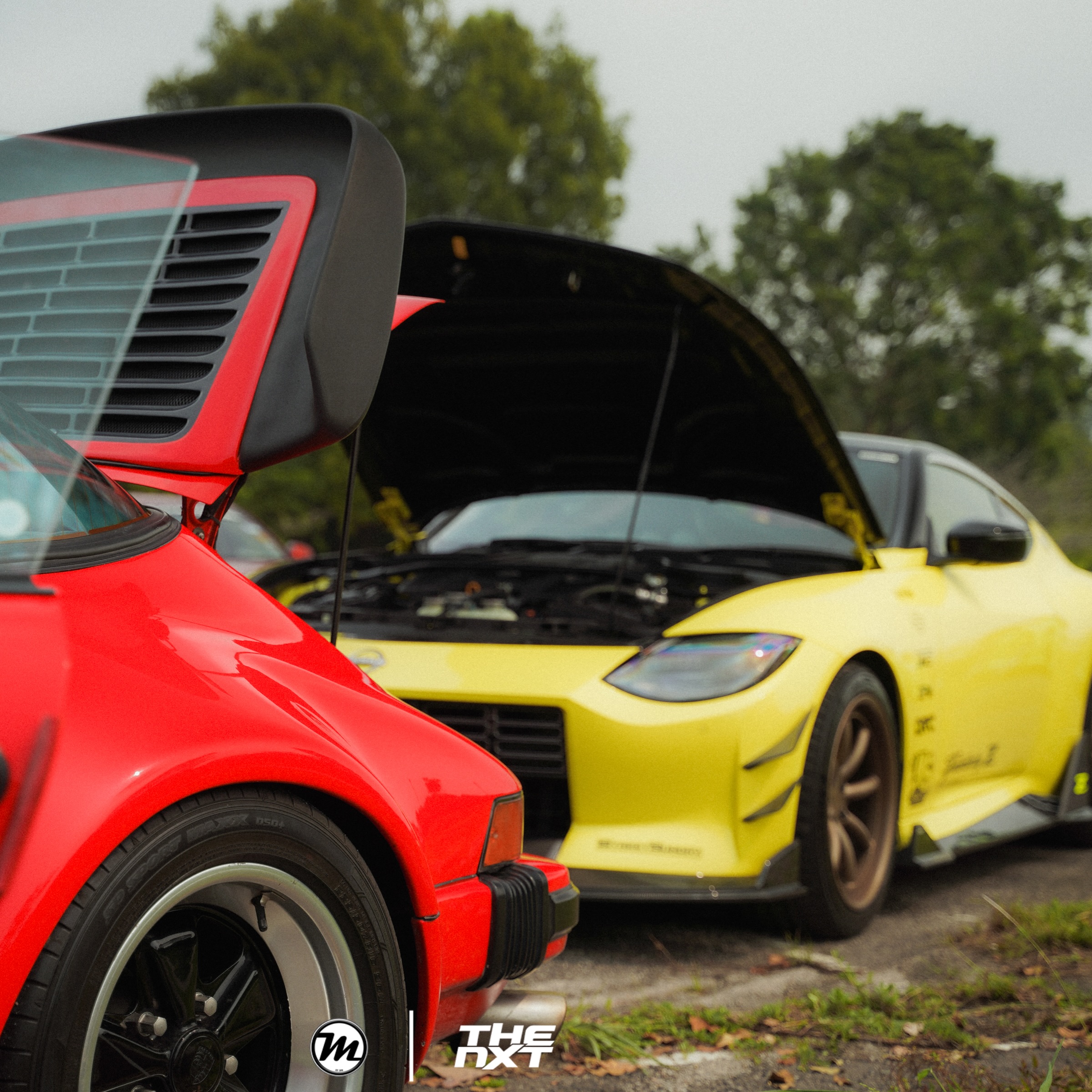 Rear wing and wide arches of a red classic Porsche 911 in MDG’s Tokyo Auto Salon Malaysia 2026 Instagram collaboration
